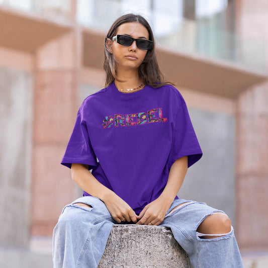 Are you a Rebel? Check out this relaxed purple women’s shirt with our famous #REBEL meme printed at the front of the tee. Only if you are truly a rebel you can wear this!