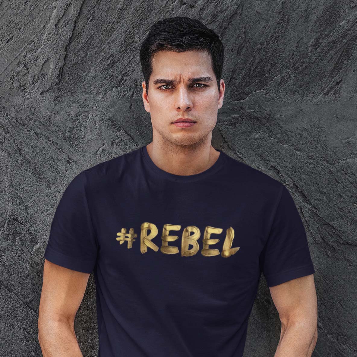 Navy men's shirt with liquid gold #REBEL meme at the front of the shirt. If you are a rebel and looking for the perfect t-shirt, this is yours!
