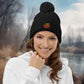 Stay warm during the colder days with this black pom pom beanie with funny meme: Extremely Hot Weirdo