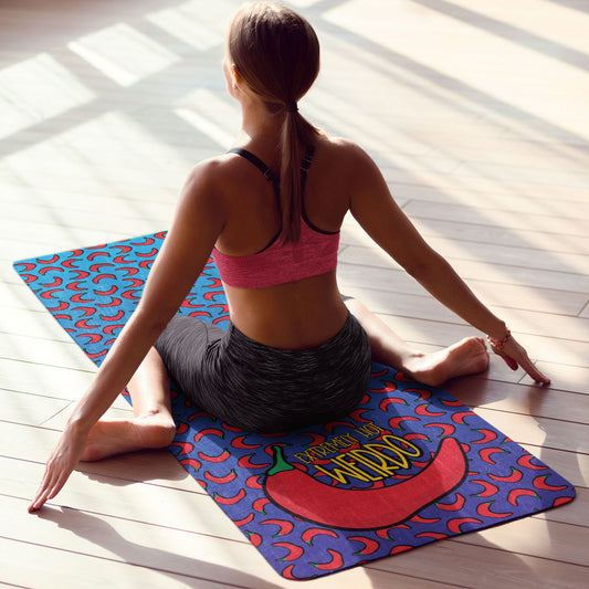 Yoga mat with funny meme: Extremely Hot Weirdo. Blue yoga mat with hot red peppers.