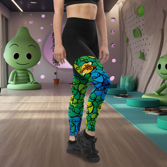 Awesome sports legging if you believe in aliens! This sports legging is black at the top and the legs are covered with alien heads and our fun meme is printed at the right upper leg: I believe in Aliens