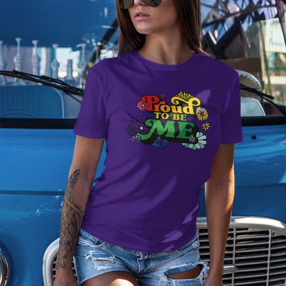 This purple women’s t-shirt has a colorful meme with flowers shown at the front of the t-shirt. Meme: PROUD TO BE ME