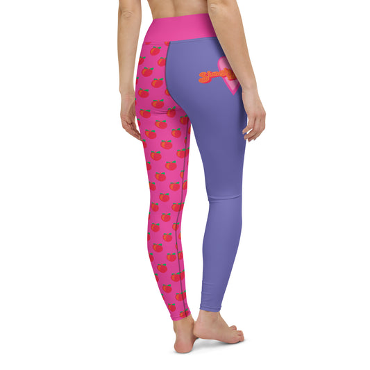 Pink and purple yoga legging with funny meme on one leg: Single Weirdo #UNSINGLEME and peach pattern on the other leg.