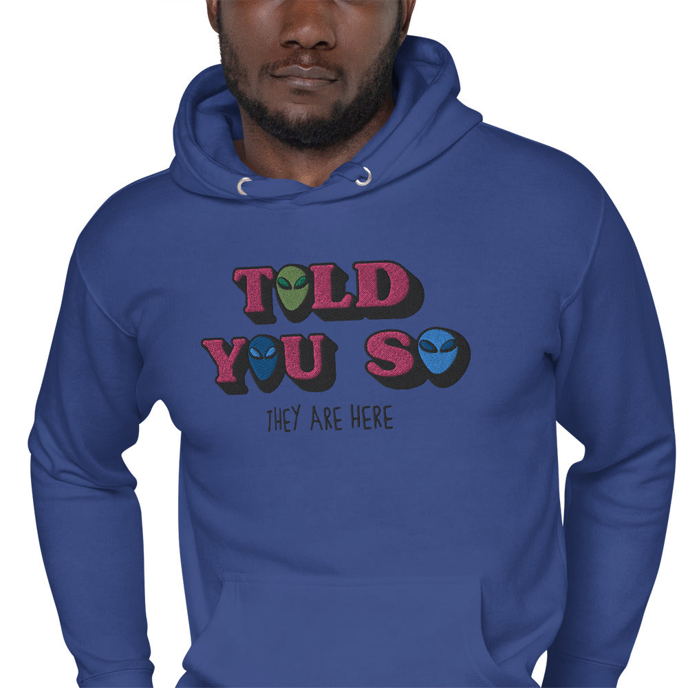 #WEIRDO | This weird and funny hoodie for weird people who believe in Aliens already being amongst us, has the funny memes: THEY ARE HERE and TOLD YOU SO embroidered at the front of the purple hoodie.
