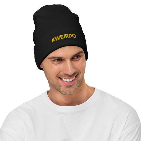 #WEIRDO | This black beanie with pom pom has our #WEIRDO meme embroidered at the front of the beanie. This funny beanie is one size and is for weird men and women. The #WEIRDO meme is embroidered in yellow.