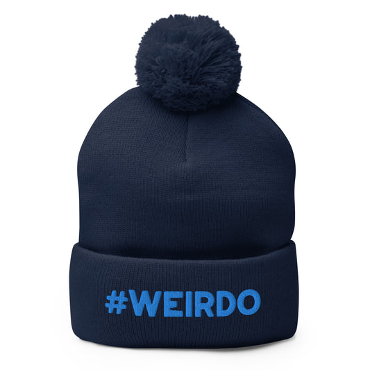 #WEIRDO | This funny beanie is a beanie with pom pom and #WEIRDO meme embroidered at the front. This navy colored beanie hat has the meme embroidered in a lighter blue color.