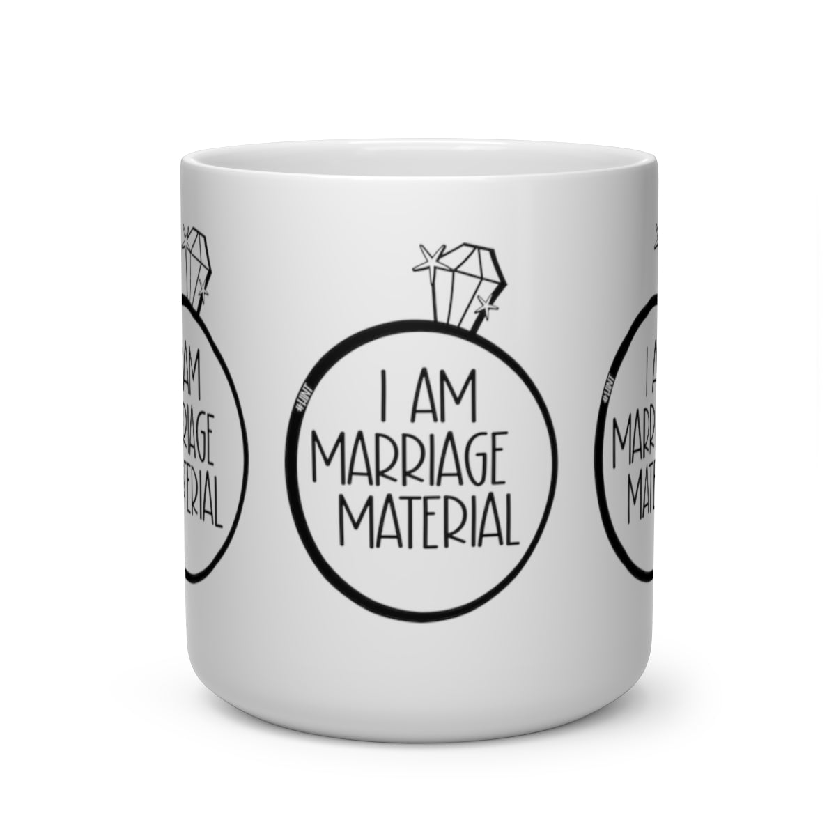 #WEIRDO | That awkward moment when you give your partner a hint that you want them to marry you! This white mug with heart shaped handle says: I AM MARRIAGE MATERIAL!