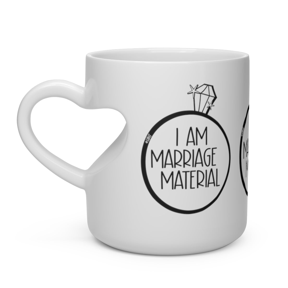 #WEIRDO | Funny short jokes like I AM MARRIAGE MATERIAL is printed 3 times on this white mug with heart shaped handle. For weird gifts to get your partner on one knee is found at hashtagweirdo.com
