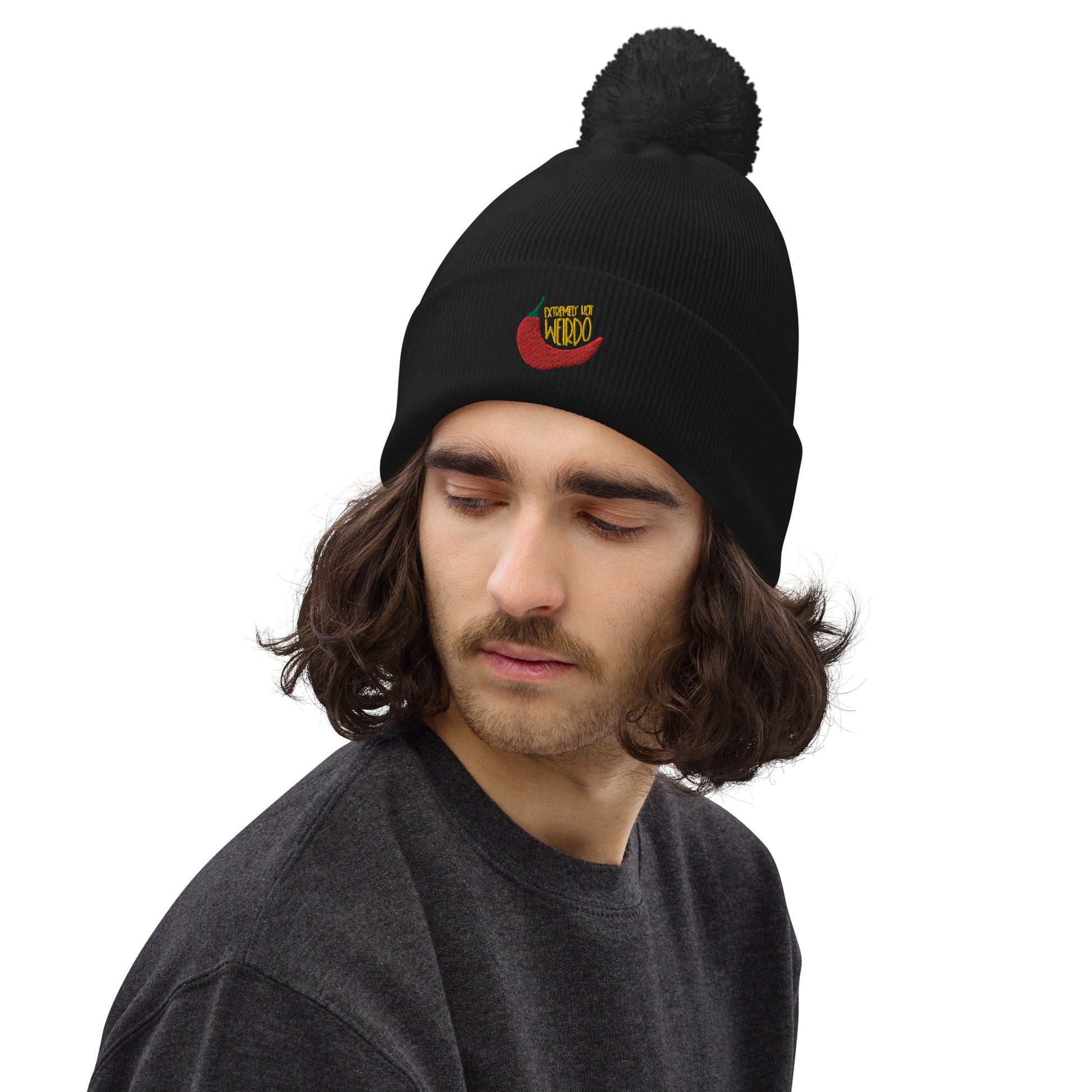 #WEIRDO | Beanie with pom pom for weird men and weird women! This black beanie has the Extremely Hot Weirdo embroidered at the front of the beanie hat. So only if you are weird and extremely hot you can wear this beanie hat!