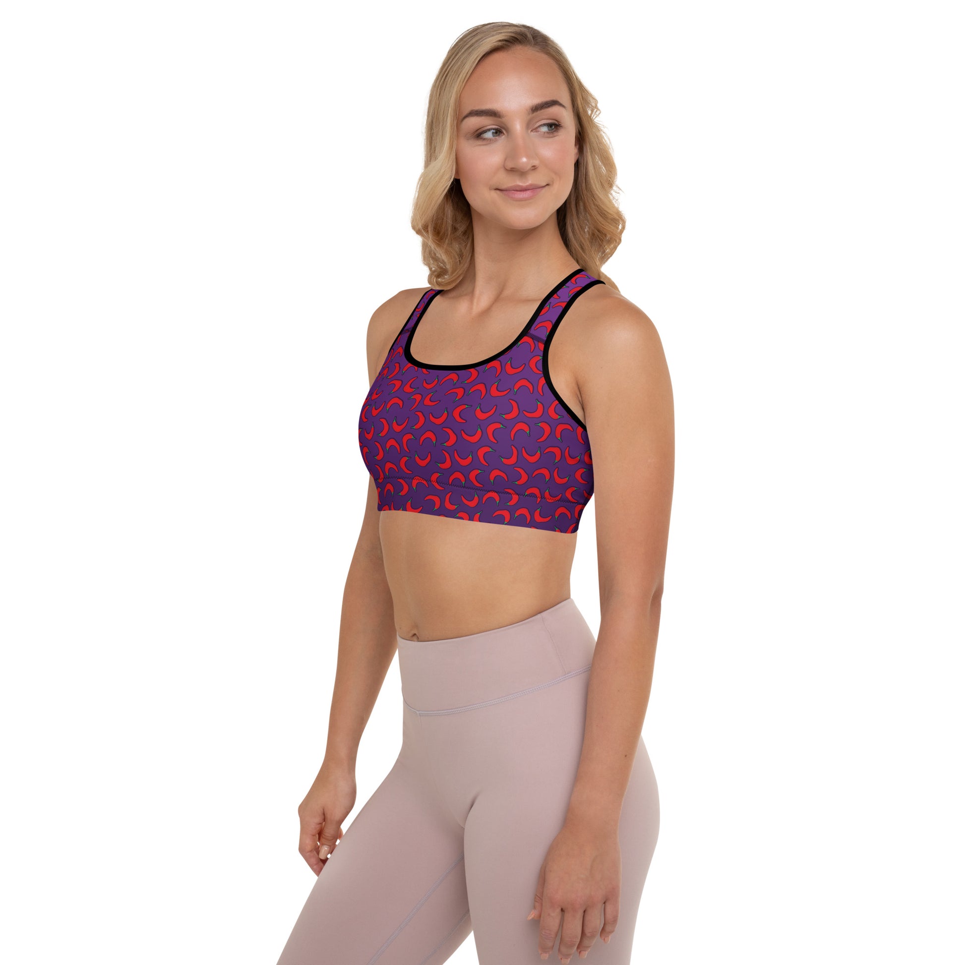 Weirdo | An extremely hot sports bra, for extremely hot weirdos! This padded sports bra in the color purple with red peppers, is for female weirdos who like sports, yoga or just a sports bra in general.