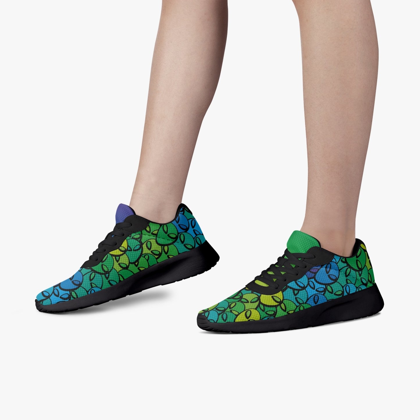 Weirdo | colorful shoes for women. These blue / green mesh shoes have aliens printed all over the shoes and are both a little different to give it some extra weirdness.