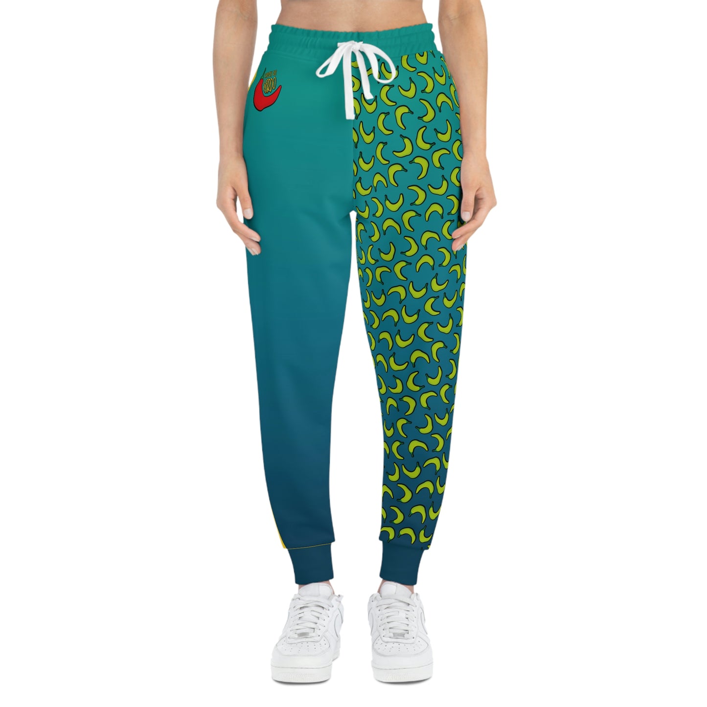 Weirdo | Athletic joggers for women in bright colors. This jogging pants for women have one leg that is covered in hot spicy green peppers.