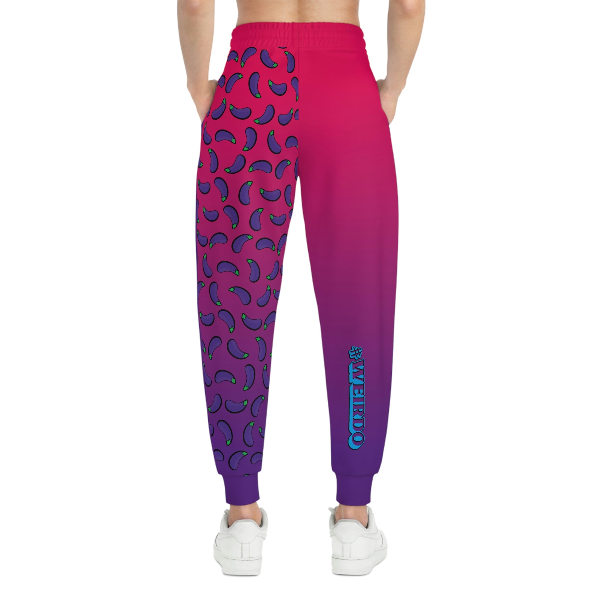 Weirdo | Athletic joggers for women in bright colors. This jogging pants for women have one purple/pink leg and one of them is covered in eggplants.