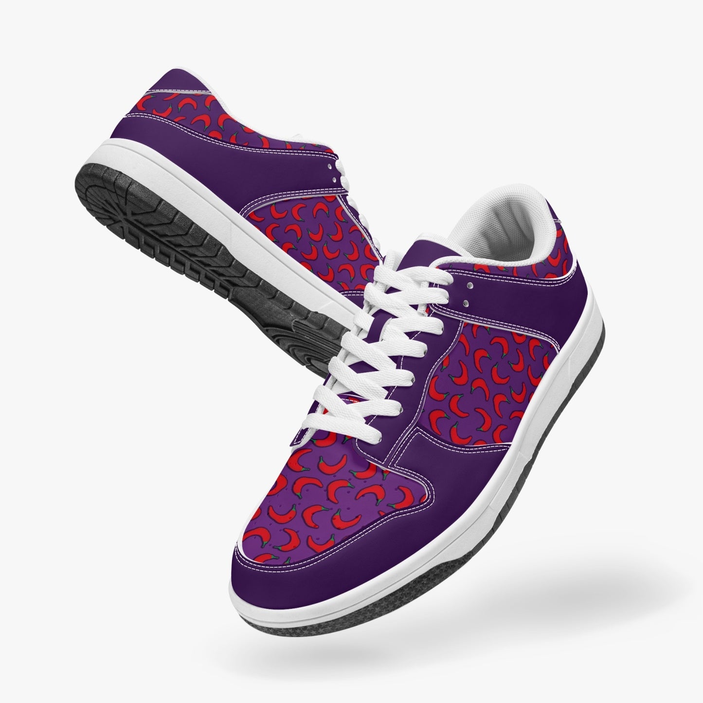 Weirdo | Dunk Stylish Low-Top Leather Sneakers for women. These sneakers are purple and have red peppers printed on parts of the shoes.