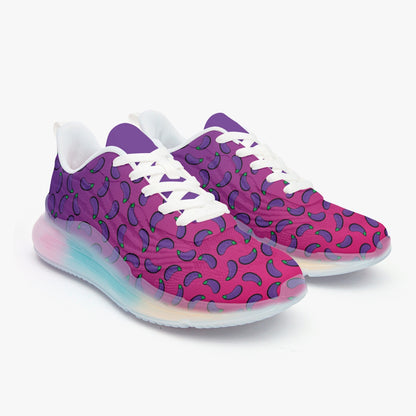 Weirdo | these awkward lightweight sneakers for women are pink/ purple and have eggplants printed all over the sneakers. The soles have 3 different colors in it, yellow, turquoise and pink. This are very colorful sneakers for weird people!